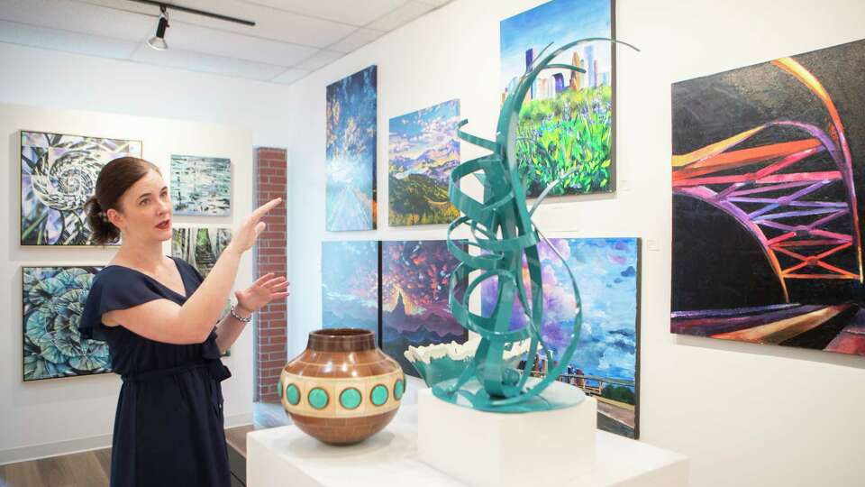 Magnolia art gallery owner Julie Verville gives a tour of newly relocated Ardest Gallery, Tuesday, May 30, 2023, in The Woodlands. The gallery, which features nearly 30 Texas artists, officially opens on June 10.