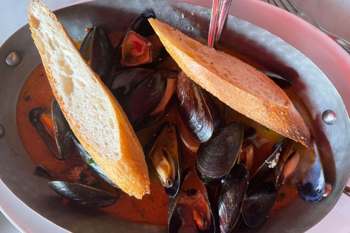 An order of garlic mussels at the Sinking Rose restaurant, located in San Francisco's North Beach neighborhood.