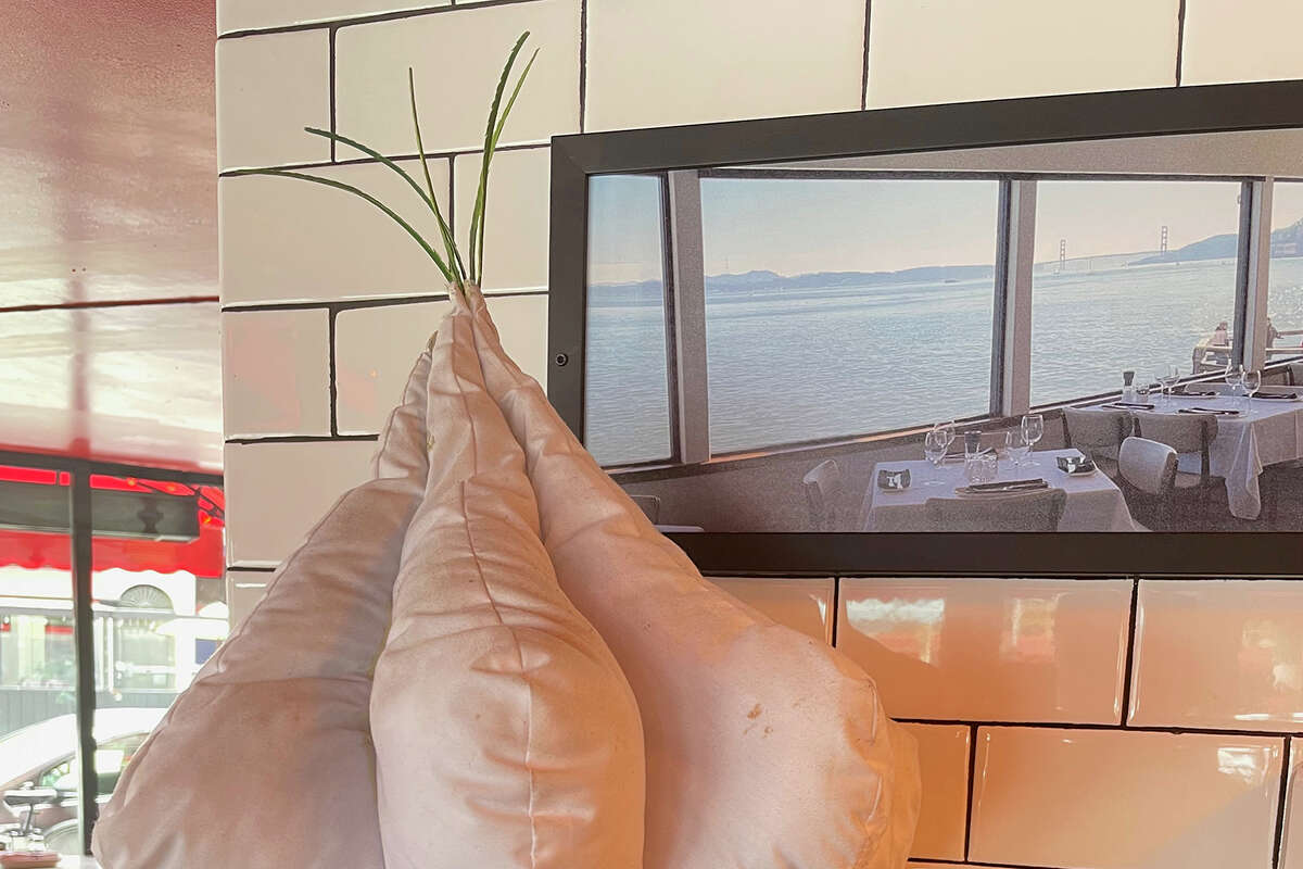 Garlic decorations abound inside the Stinking Rose restaurant, in San Francisco's North Beach neighborhood. 