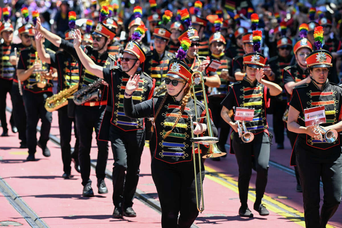 At San Francisco's annual Pride Parade, you can expect to see all sorts of exuberantly decorated floats, organized groups, politicians, dancers and, in this case, a full marching band uniformed in pride colors. 