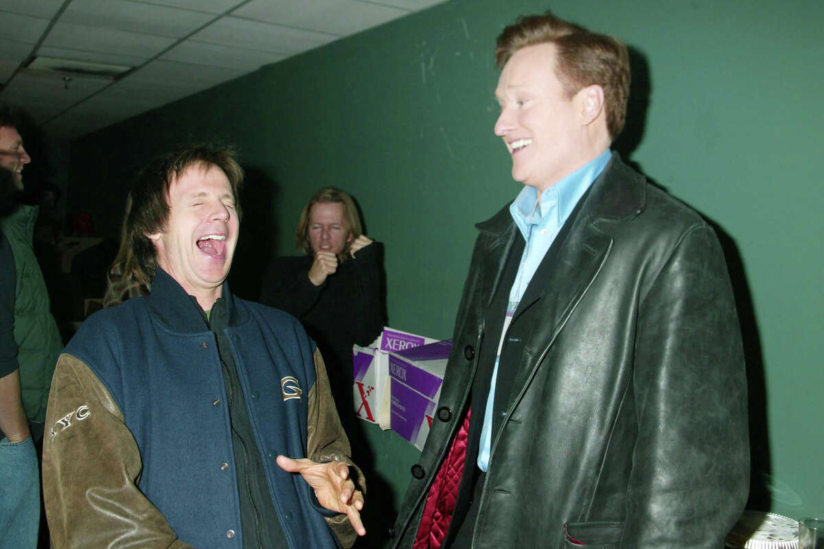 Conan O’Brien and Dana Carvey stand backstage during Night of Too Many Stars at the Roseland Ballroom in New York in February 2003.