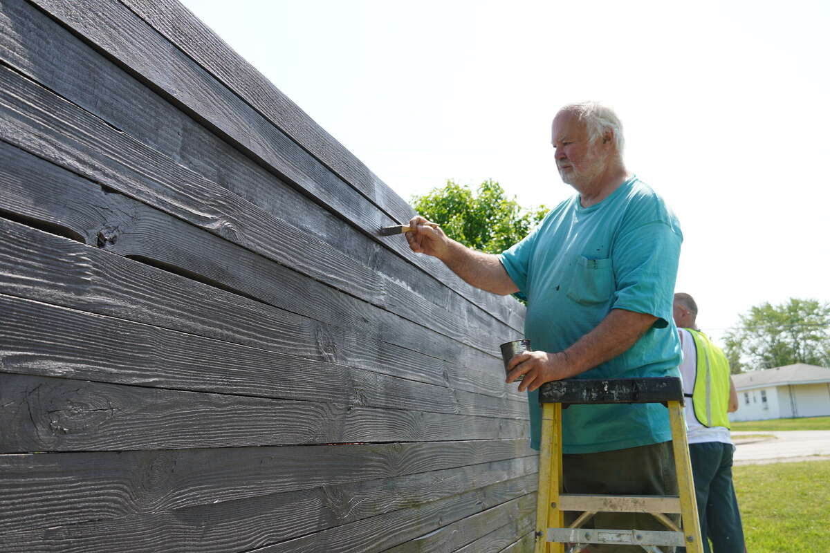 to Bad Axe signs touched up after months of planning