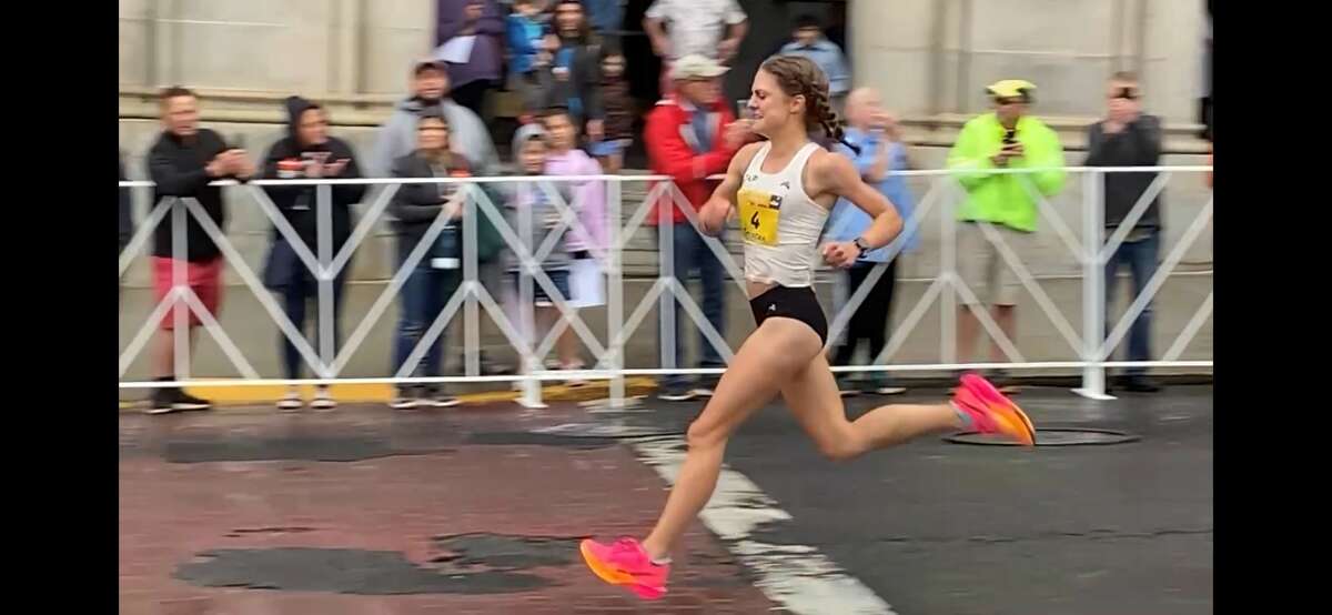 Tristin Van Ord sprints down Washington Avenue on her way to victory in Saturday's Freihofer's Run For Women. She prevailed in 15 minutes, 54 seconds.