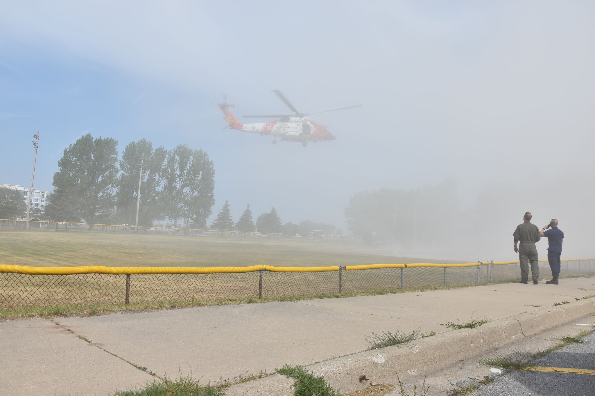 Traverse City Coast Guard helicopter lands in Manistee softball field