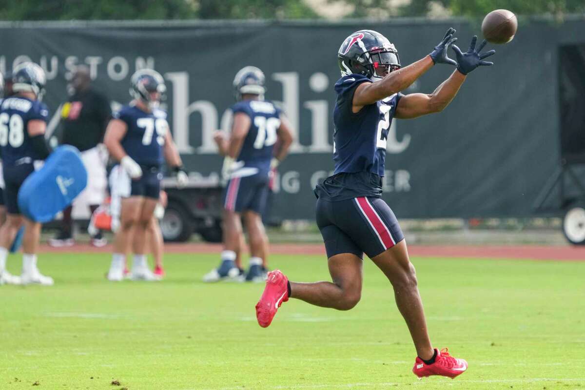 Houston Texans' Adedayo Odeleye (75) stretches during an NFL