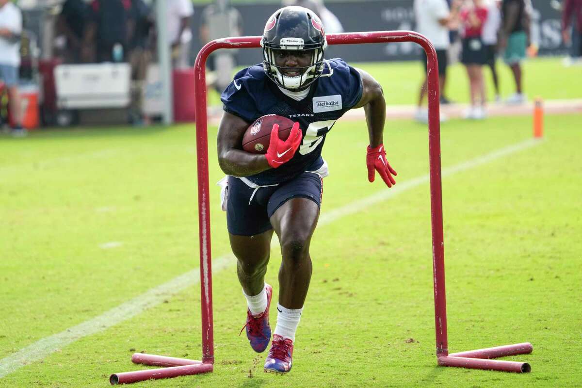 Houston Texans' Adedayo Odeleye (75) stretches during an NFL