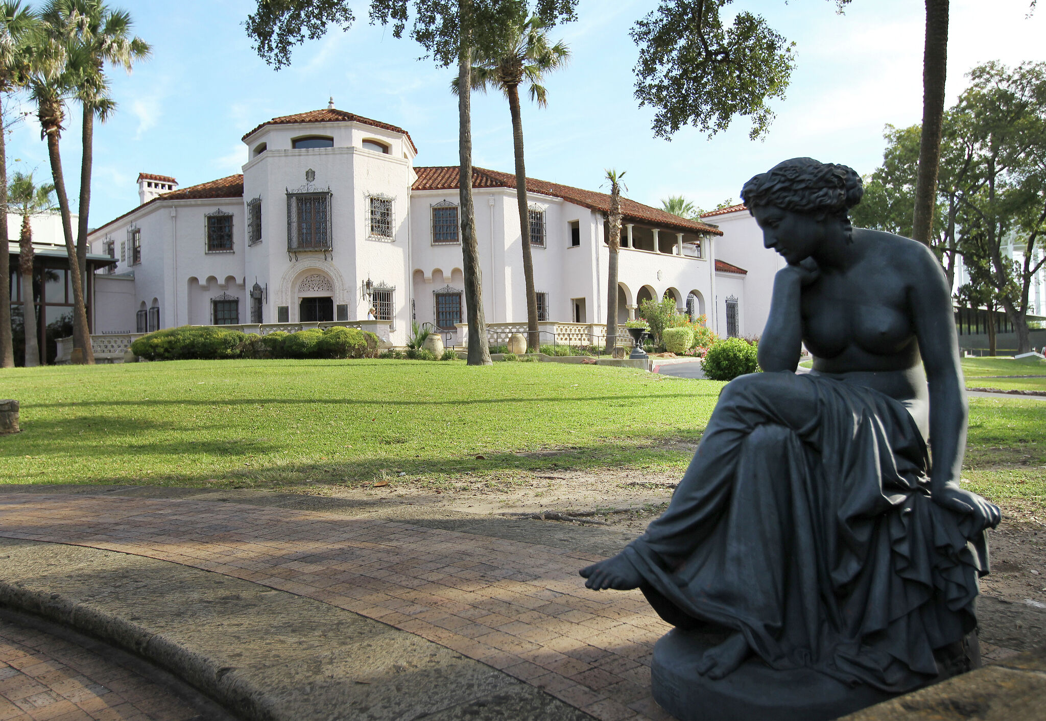 McNay museum grounds suitable for both cypress trees and cactuses