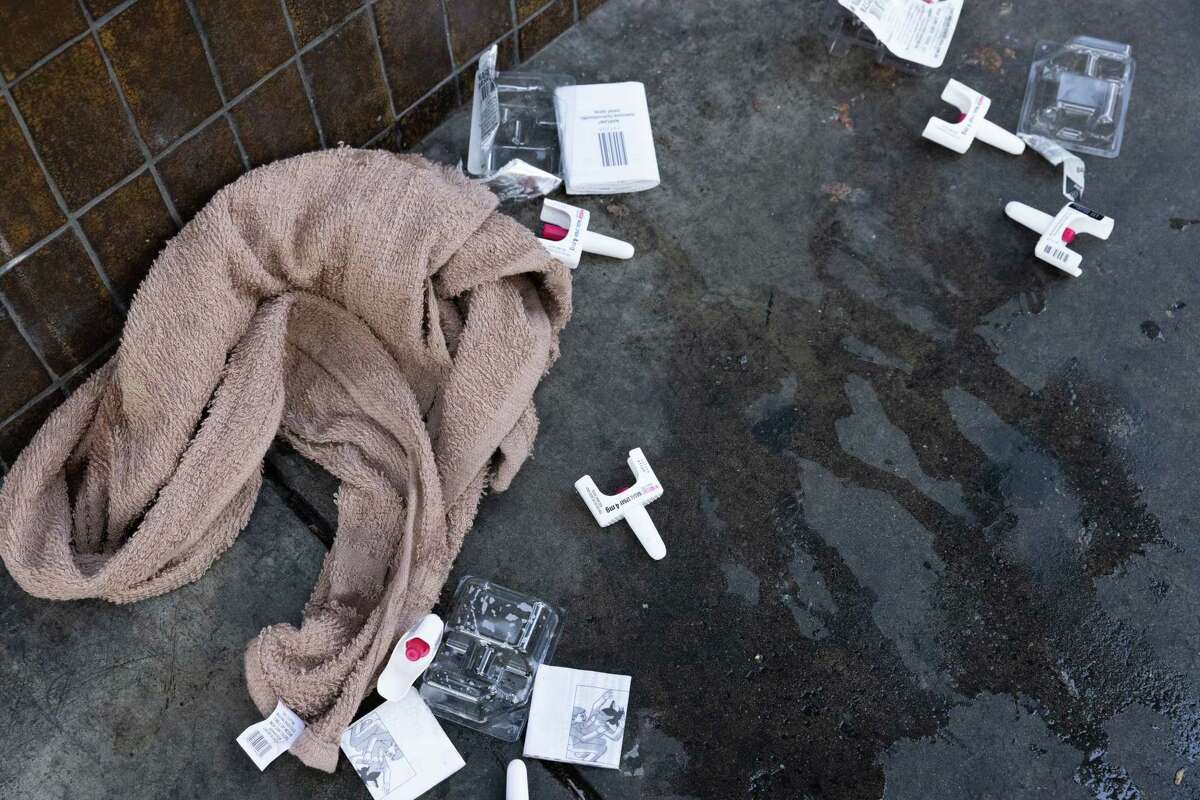 Used Narcan nasal spray kits are scattered near where they were administered to someone showing signs of a drug overdose in San Francisco. SB43 would define drug use disorder as a grave disability under the state’s conservatorship law.