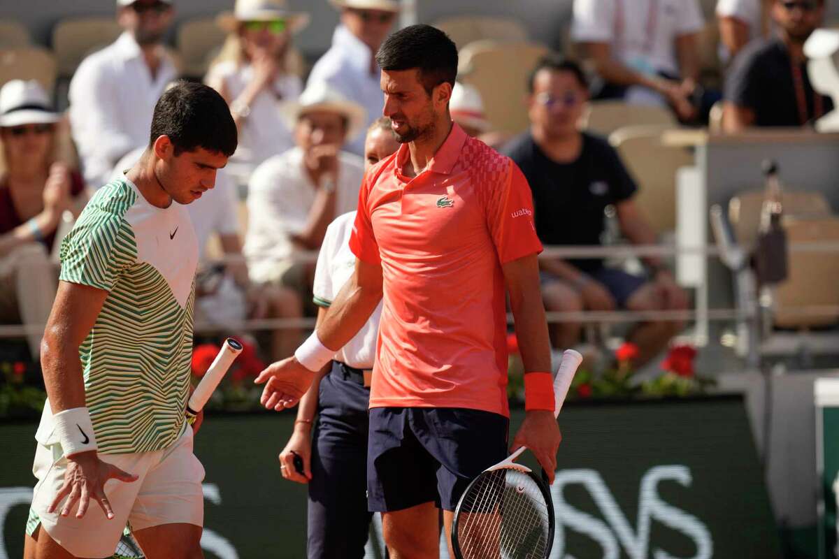 Novak Djokovic beats cramping Carlos Alcaraz in French Open semifinal