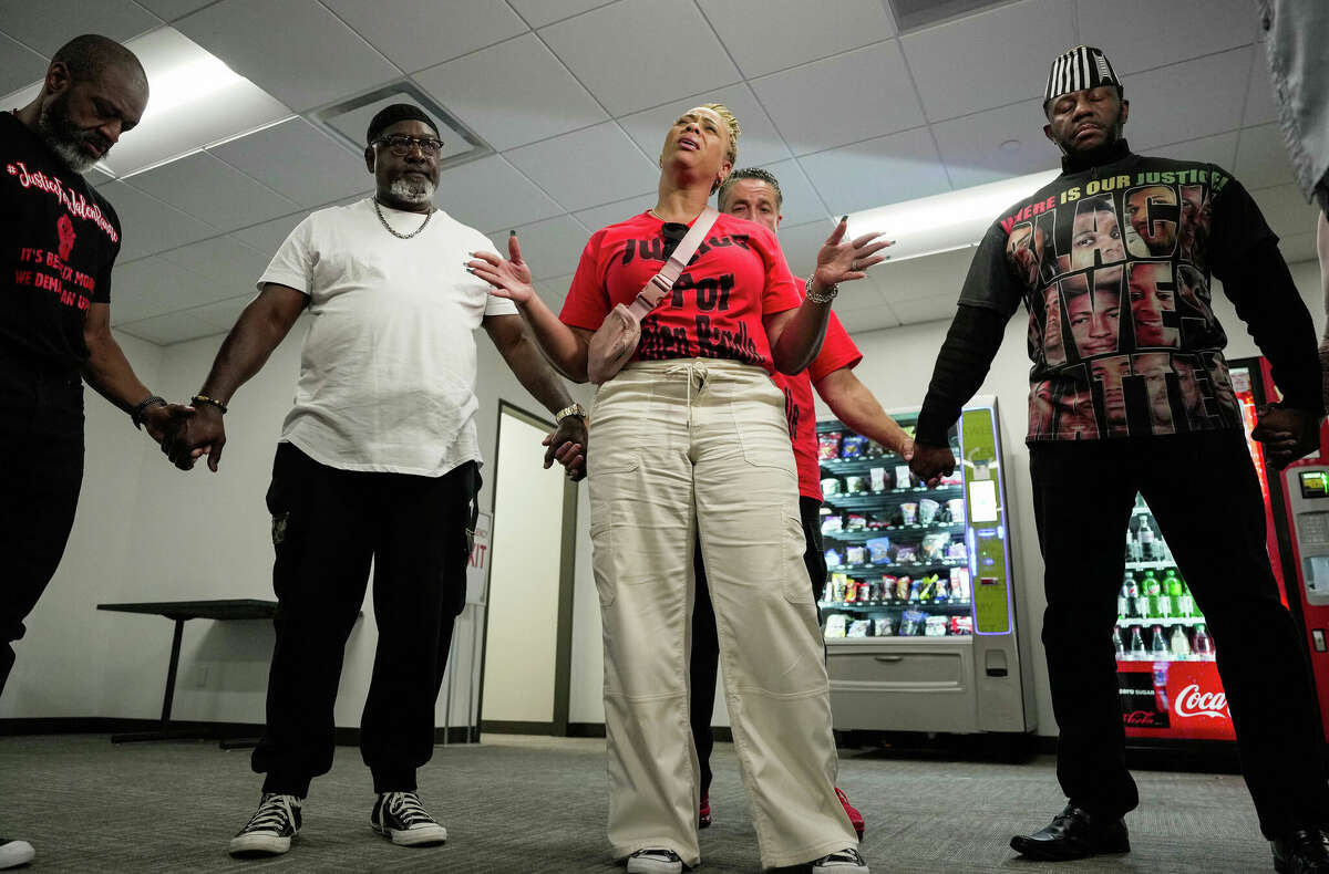 Mother Tiffany Rachal, 51 of Jalen Randle, who was fatally shot by Houston police officer Shane Privette in April 2022, prays alongside family and friends as they wait for a decision from the Harris County grand jury on Wednesday, April 26, 2023 in Houston. The Harris County grand jury decided to take no action on potential charges against Houston police officer Shane Privette, meaning the case will be presented to a new grand jury as soon as is practical.