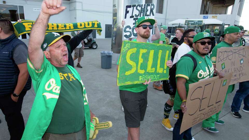 A's fans come out en masse for reverse boycott and tell owner John Fisher  to sell