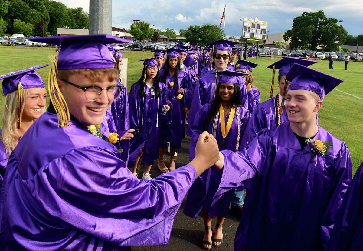 Ellington High School graduates celebrate their