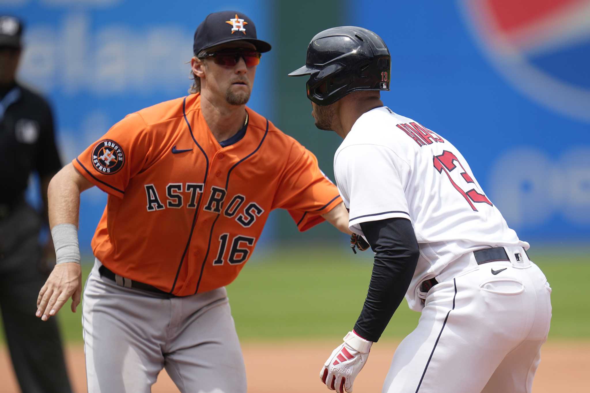 Cleveland Guardians' Will Brennan catches a fly ball hit for an out by  Houston Astros' Yainer Diaz in the second inning of a baseball game Sunday,  June 11, 2023, in Cleveland. (AP