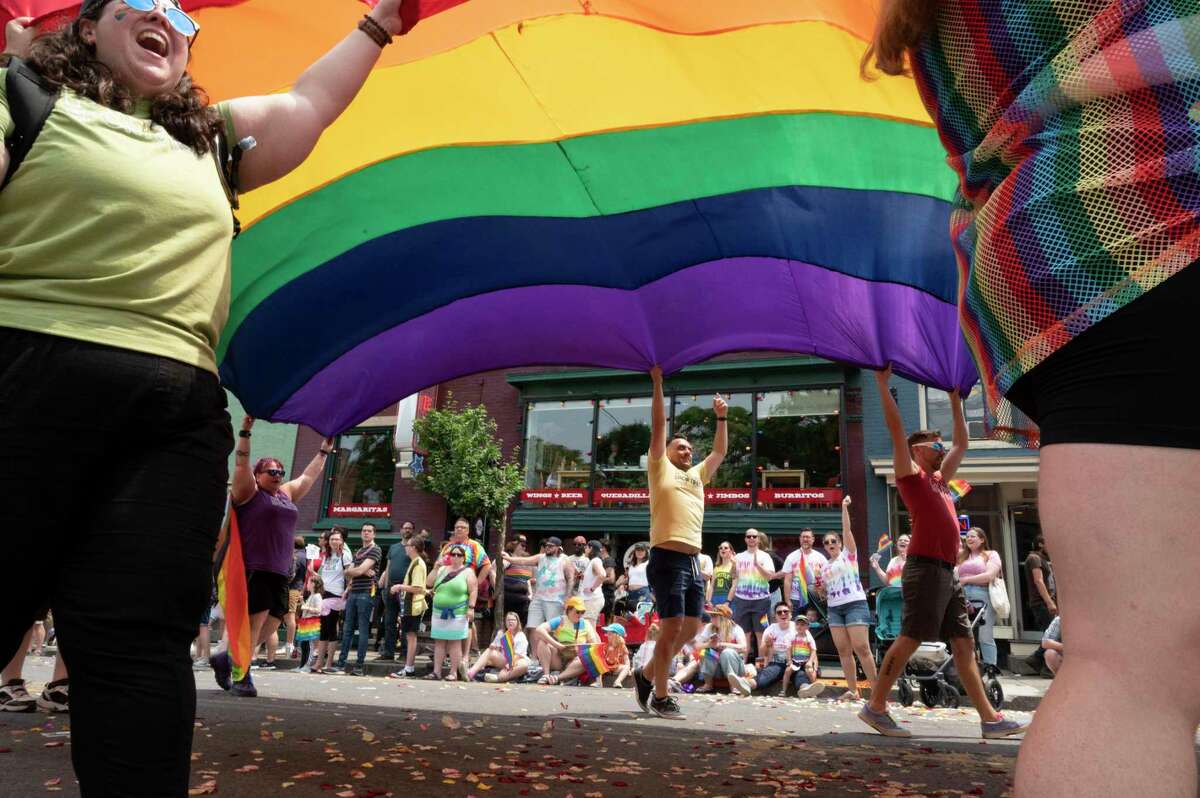 The Capital Pride Parade makes its way up Lark St. on Sunday, June 11, 2023, in Albany, N.Y. Music and festivities followed in Washington Park. (Lori Van Buren/Times Union)