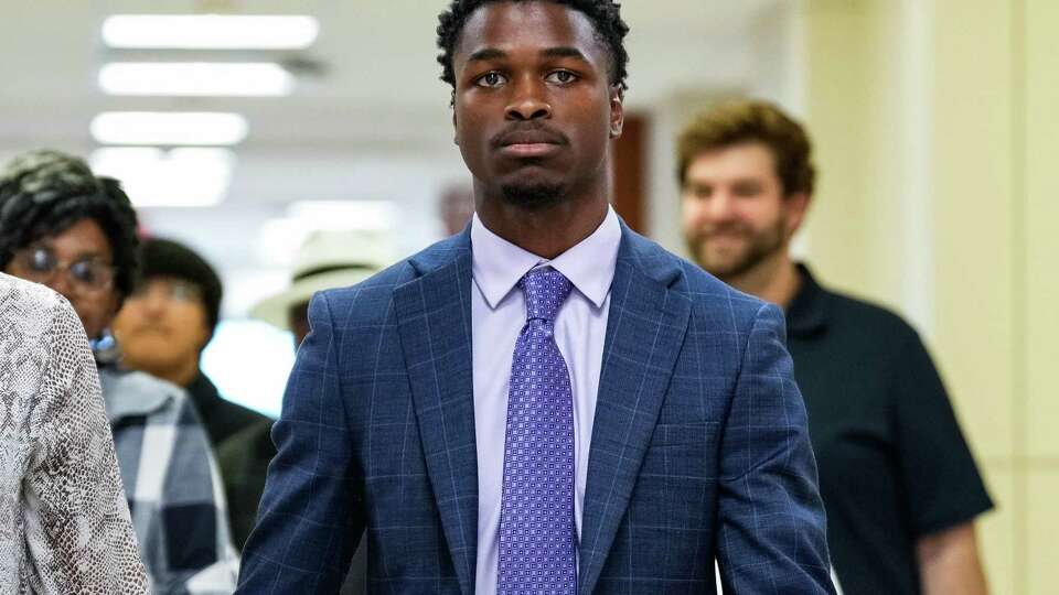 Antonio Armstrong Jr., walks into the 178th District Criminal Court for his capital murder trial on Monday, June 12, 2023 in Houston. Armstrong is accused of killing his parents in 2016.