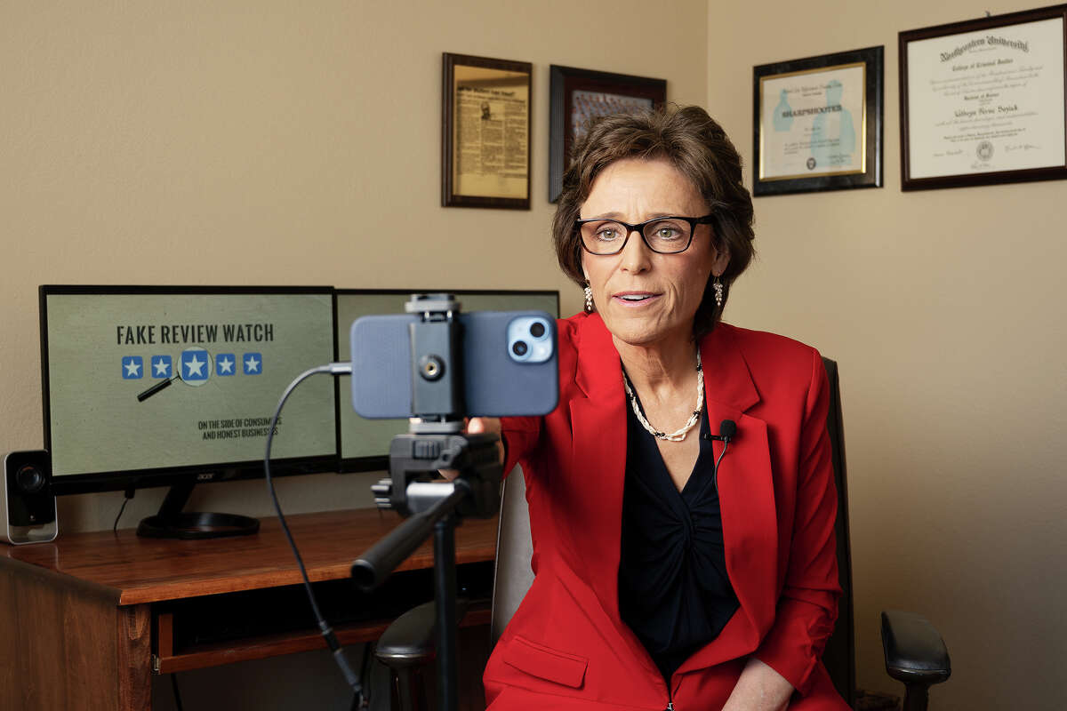 Kay Dean shows her studio set up in her home office in San Jose Calif., June 9, 2023