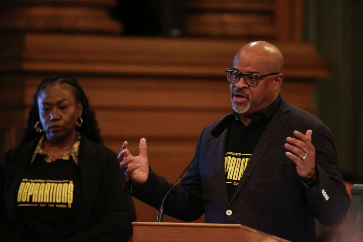 Eric McDonnell, chair of the African American Reparations Advisory Committee, speaks at the San Francisco Board of Supervisors’s public hearing about the city’s draft reparations plan at City Hall in San Francisco on March 14. For committee members like McDonnell, the journey has left a lasting impact on their lives.  