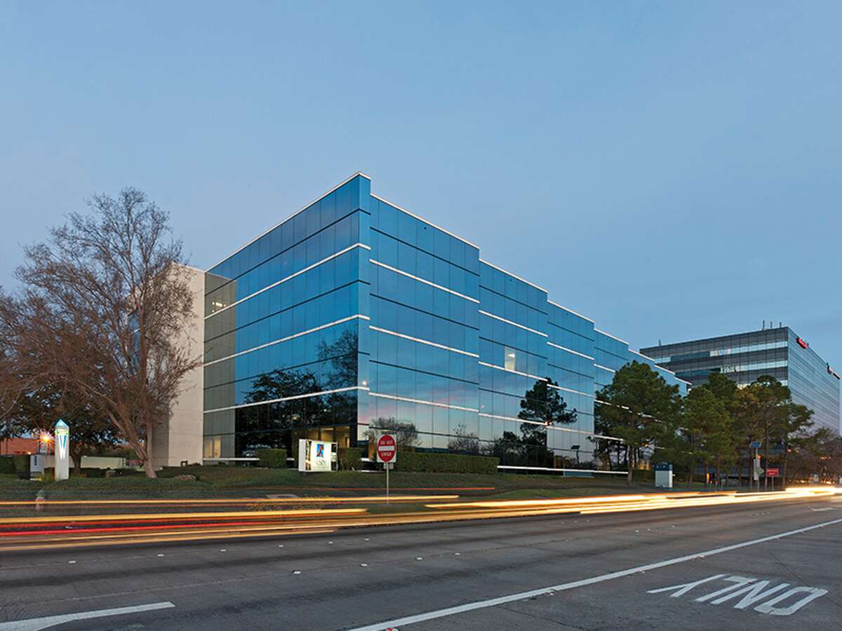 Woodlands trophy office tower lands headquarters tenants