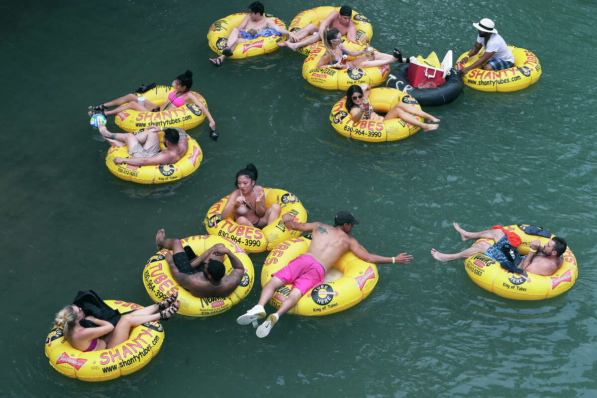 A party of tubers hits the water near Sattler on the Guadalupe River near New Braunfels.