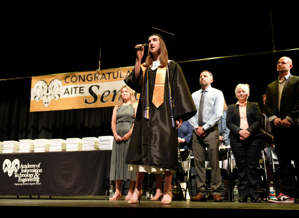 Graduating senior Sarah Barry sings the National Anthem at the Class of 2023 Commencement Ceremony at Academy of Information Technology & Engineering (AITE) in Stamford, Conn. Tuesday, June 13, 2023.