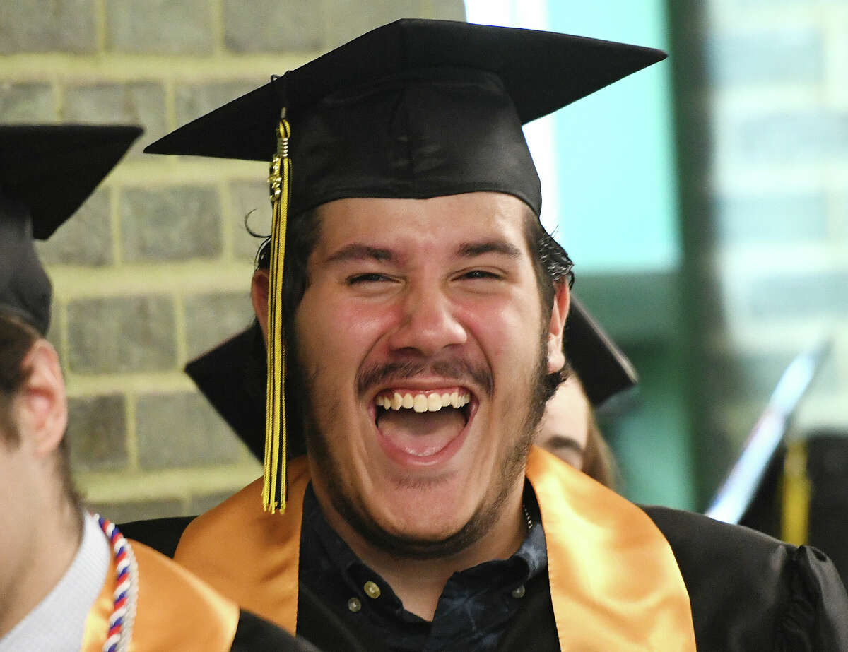 Nathyis Barros smiles during the Class of 2023 Commencement Ceremony at Academy of Information Technology & Engineering (AITE) in Stamford, Conn. Tuesday, June 13, 2023.