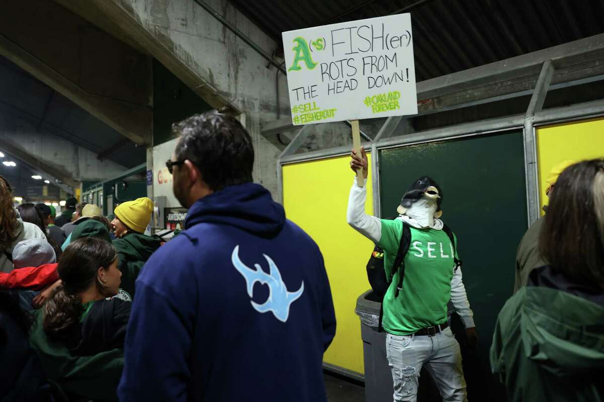 A's fans chant 'Sell the team' and 'Fisher sucks' to protest the team's  move to Las Vegas