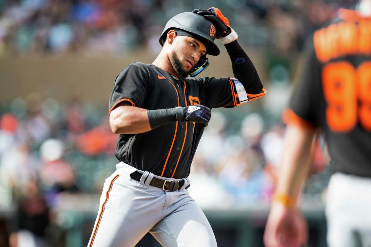 Luis Matos of the San Francisco Giants looks on from the dugout