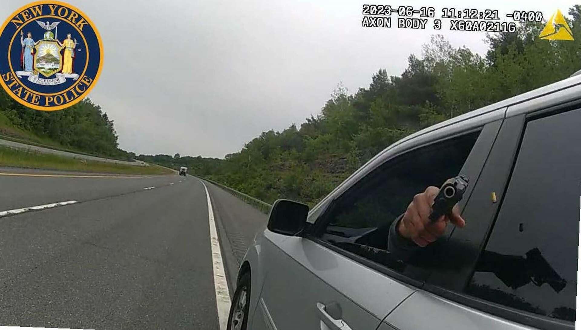 Driver in trooper shooting incident charged with robbery