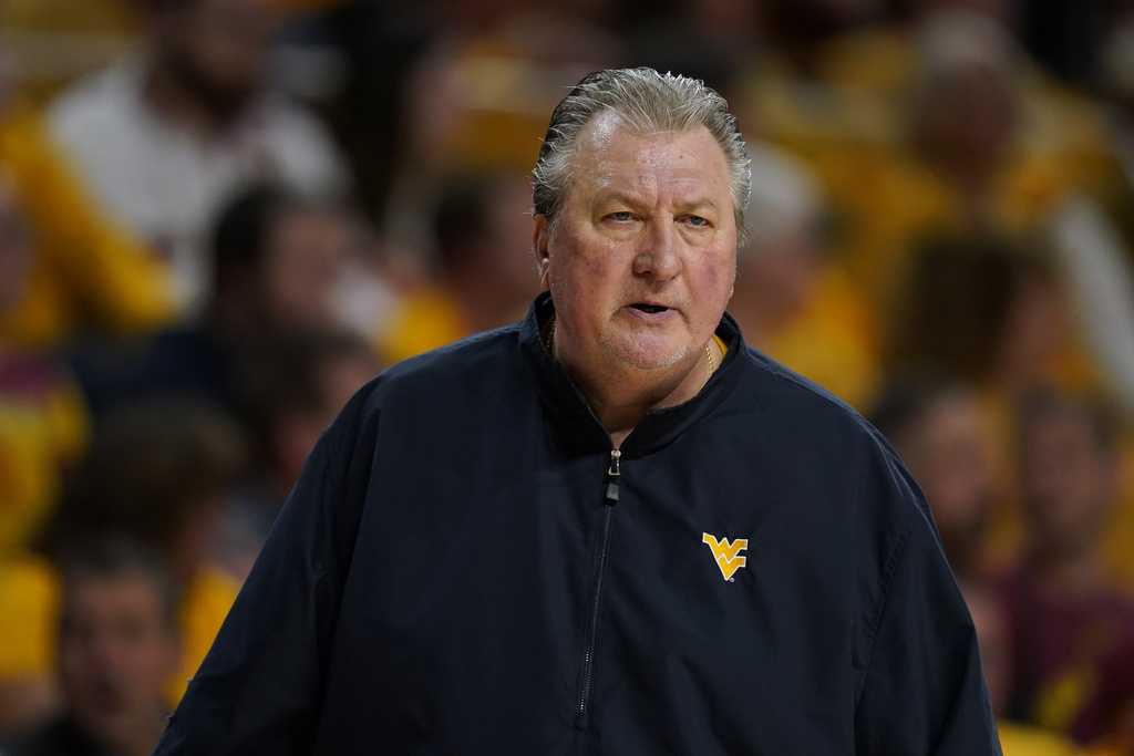 West Virginia basketball coach Bob Huggins resigns hours after drunken