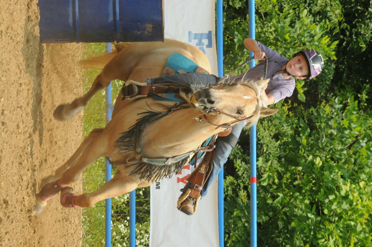 Barrel racers take to Illinois Boots and Saddle Club Arena in Alton