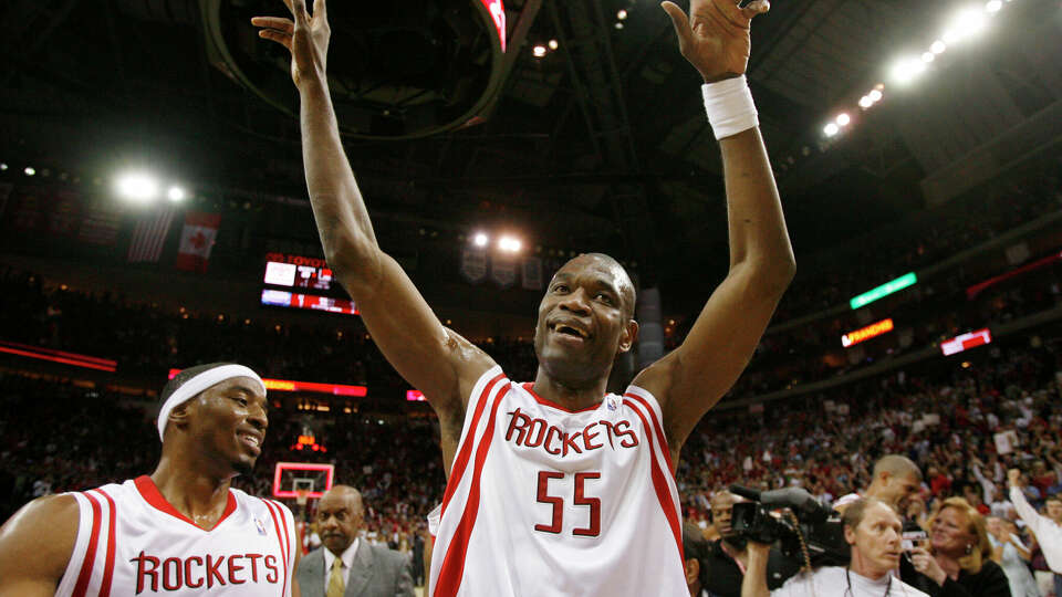 Houston Rockets' Dikembe Mutombo (55) celebrates the Rockets win over the Charlotte Bobcats at Toyota Center Friday, March 14, 2008, in Houston. The Rockets beat the Bobcats 89-80 for a 21-game winning streak. (Brett Coomer / Chronicle)