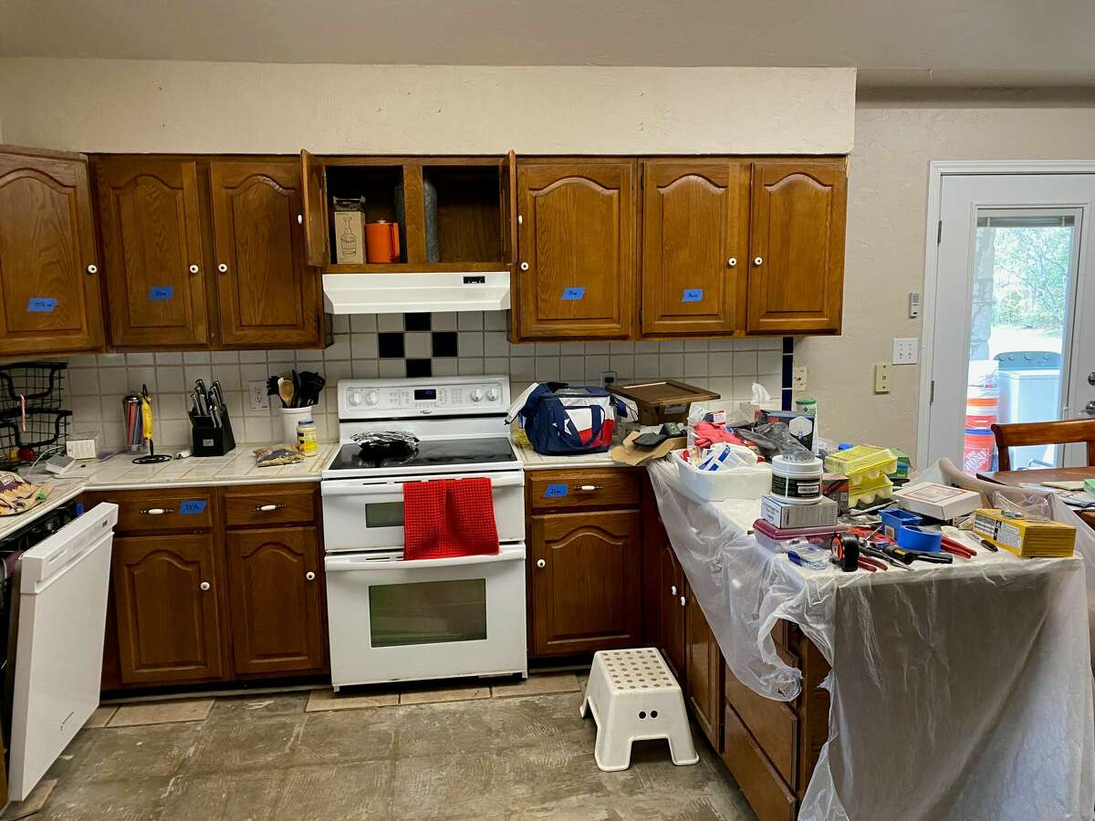 Before the renovation, the tired kitchen was awash in browns