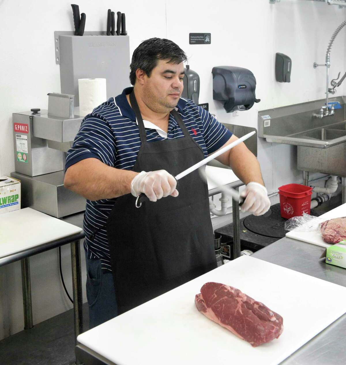 Father, son from Brazil open Tomahawk Meat Market in Danbury