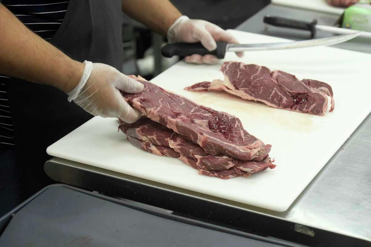 Father, son from Brazil open Tomahawk Meat Market in Danbury