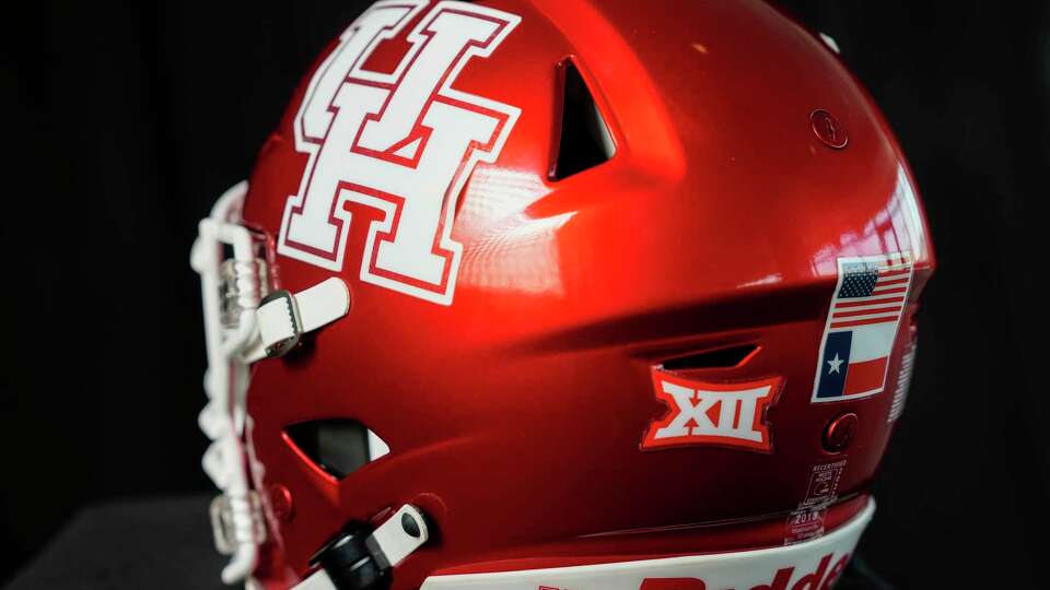 A University of Houston football helmet with a Big 12 logo is shown on Tuesday, June 20, 2023 in Houston
