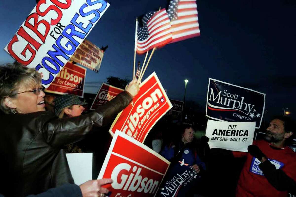 Supporters for Congressmen Scott Murphy and Republican challenger Chris Gibson gather before the debate for the New York State 20th Congressional District in Queensbury on Oct. 19, 2010. (Michael P. Farrell / Times Union)