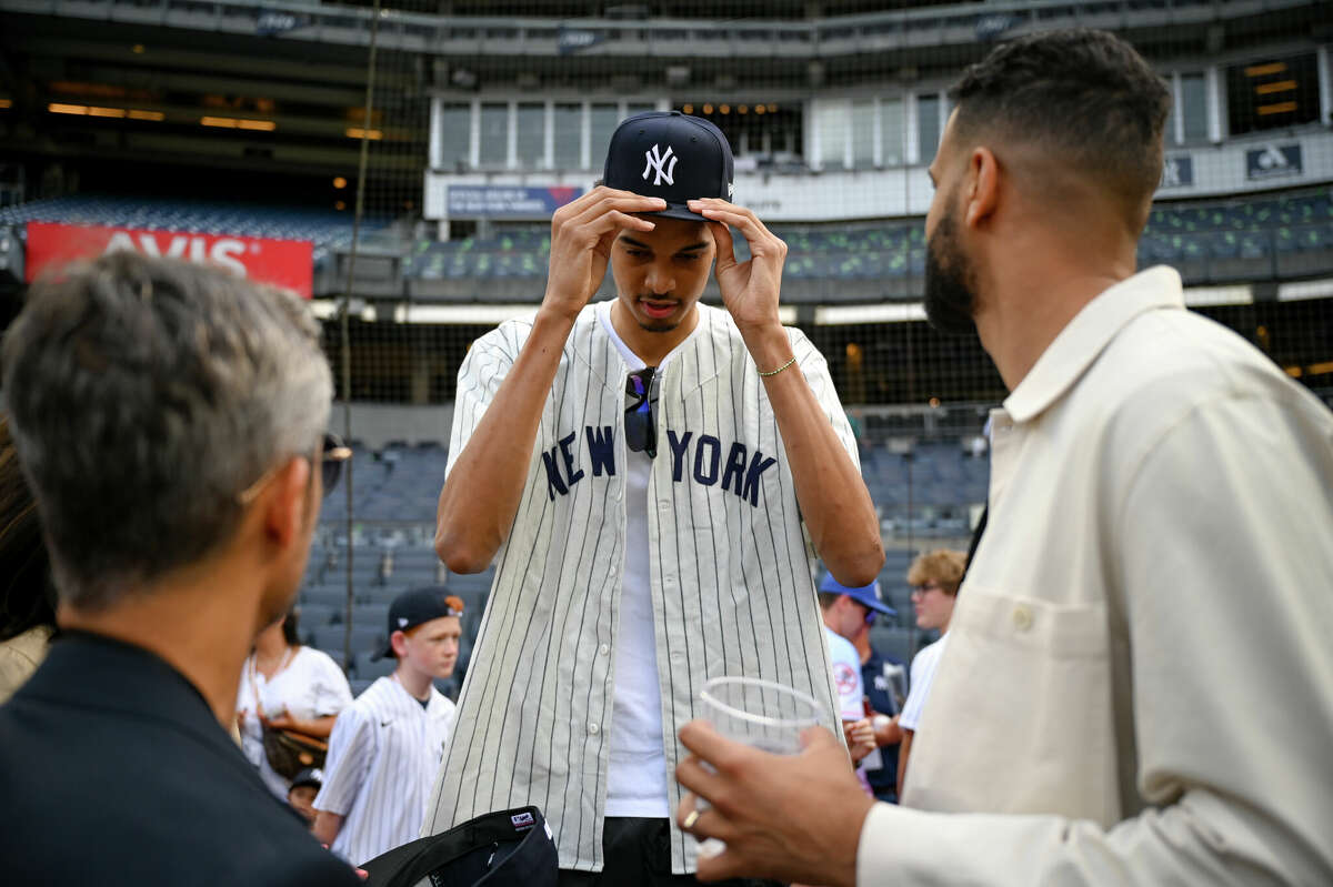 Victor Wembanyama throws out ceremonial first pitch at Yankee Stadium ahead  of NBA draft