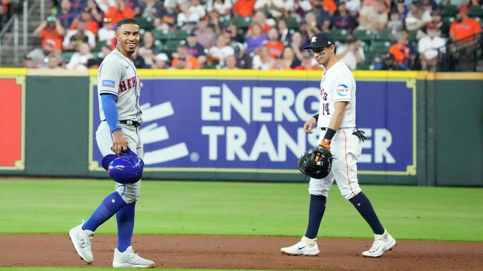 New York Mets Francisco Lindor (12) walks back to first base after Pete Alonso was called out by batters interference during the first inning of an MLB baseball game at Minute Maid Park on Wednesday, June 21, 2023 in Houston.