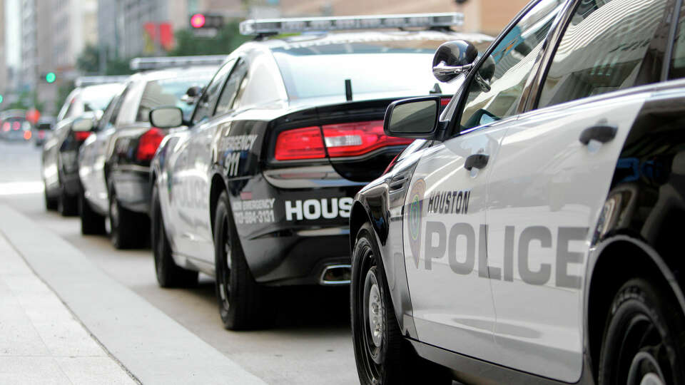 Houston Police Department reveals the new image for future HPD patrol vehicles outside Houston Police Department Headquarters in Downtown on Monday, July 2, 2012, in Houston. HPD is currently testing vehicles for the new patrol cars, along with the new black and white color scheme and logo design. ( Mayra Beltran / Houston Chronicle )