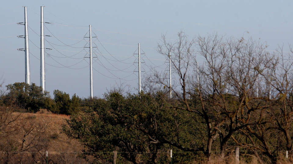 Giant electric transmission lines tower over the landscape near Menard in this file photo. The PBPA continues to work with Oncor, the PUC and ERCOT to expand electricity available to meet the needs of West Texans and oil and gas producers.