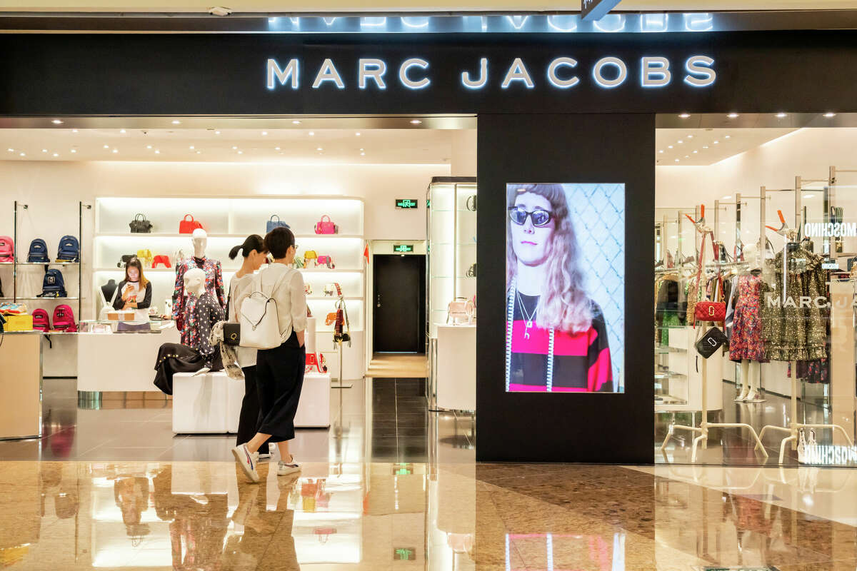 Customers visit a Marc Jacobs store.