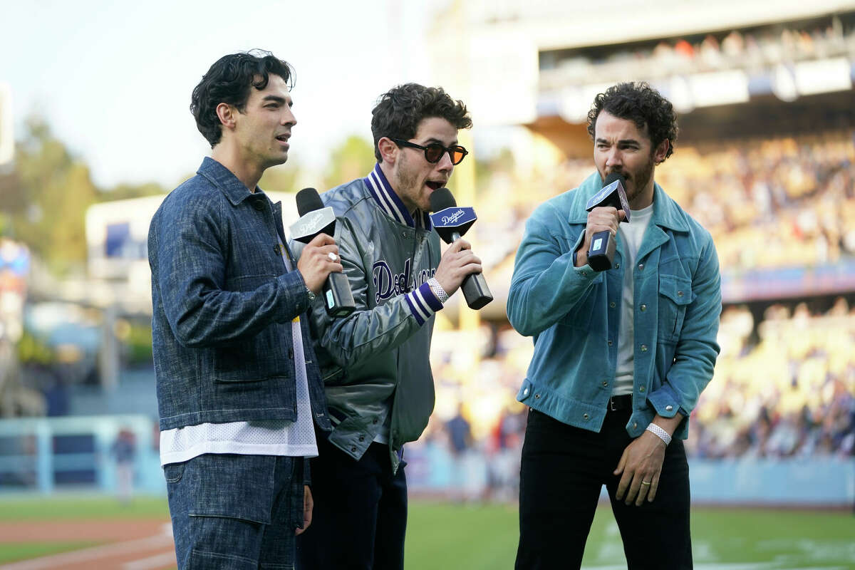 The Jonas Brothers, from left, Nick, Joe and Kevin perform during