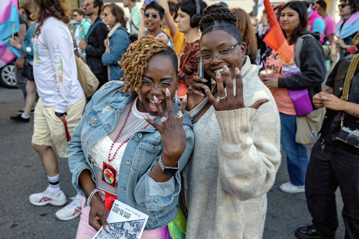 Gracie and Crystal, who just got married, march in the San Francisco Trans March on Friday, June 23.