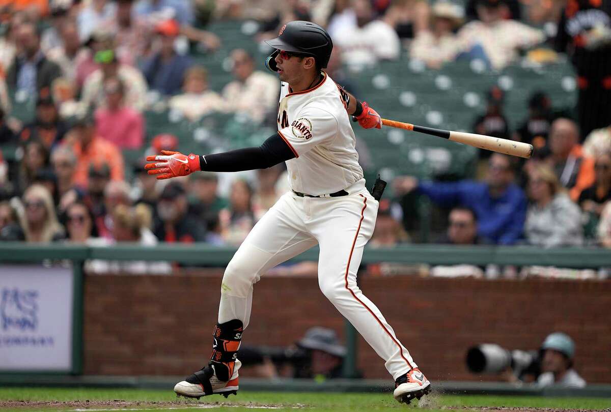 Isan Diaz of the San Francisco Giants looks on from the dugout