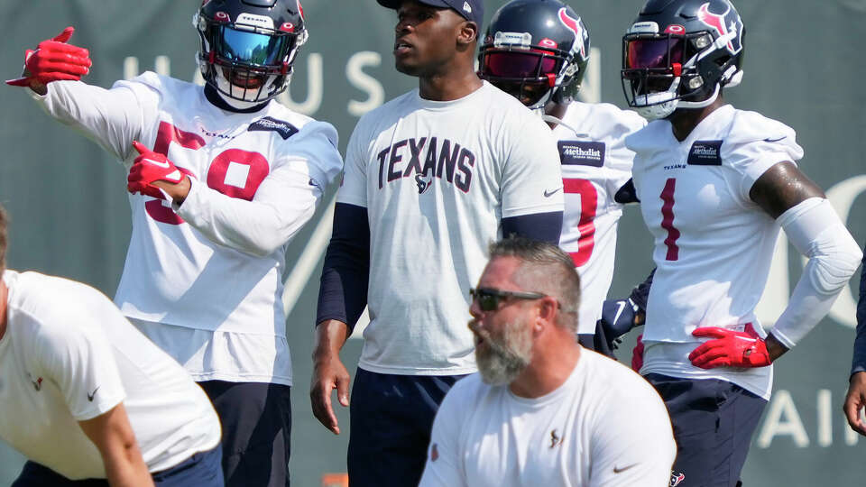 Houston Texans linebacker Christian Kirksey (58) works with head coach DeMeco Ryans during OTAs on Tuesday, May 23, 2023, at Houston Methodist Training Center in Houston.