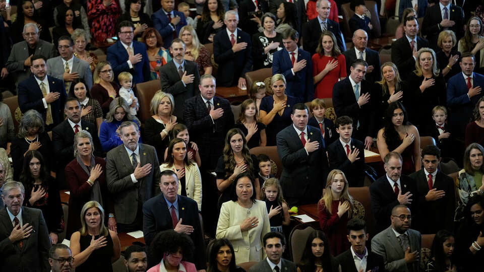 Texas House members with family and guests crowd the House Chamber at the Texas Capitol for the opening of the 88th Texas Legislative Session in Austin, Texas, Tuesday, Jan. 10, 2023. (AP Photo/Eric Gay)