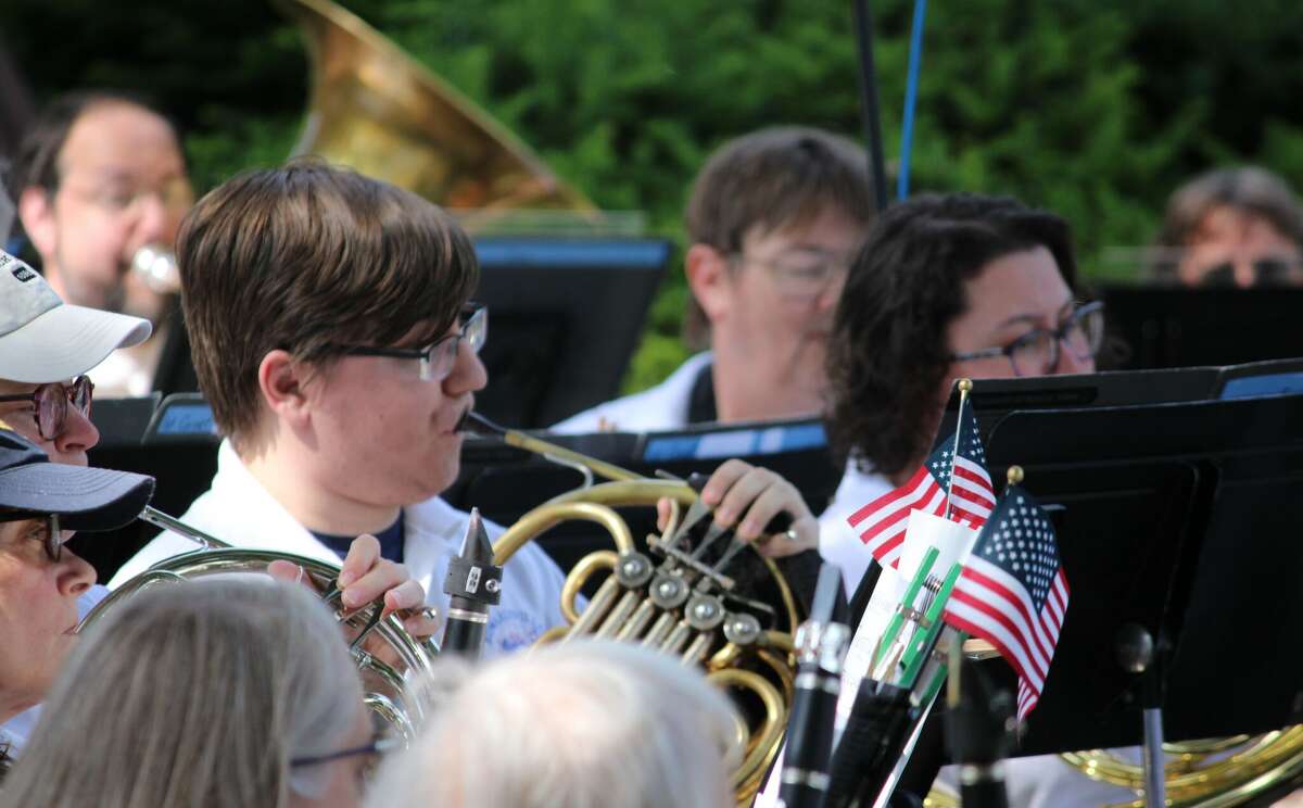 The Edwardsville Municipal Band, shown here during Memorial Day ceremonies at Woodlawn Cemetery, will perform at two events this week.