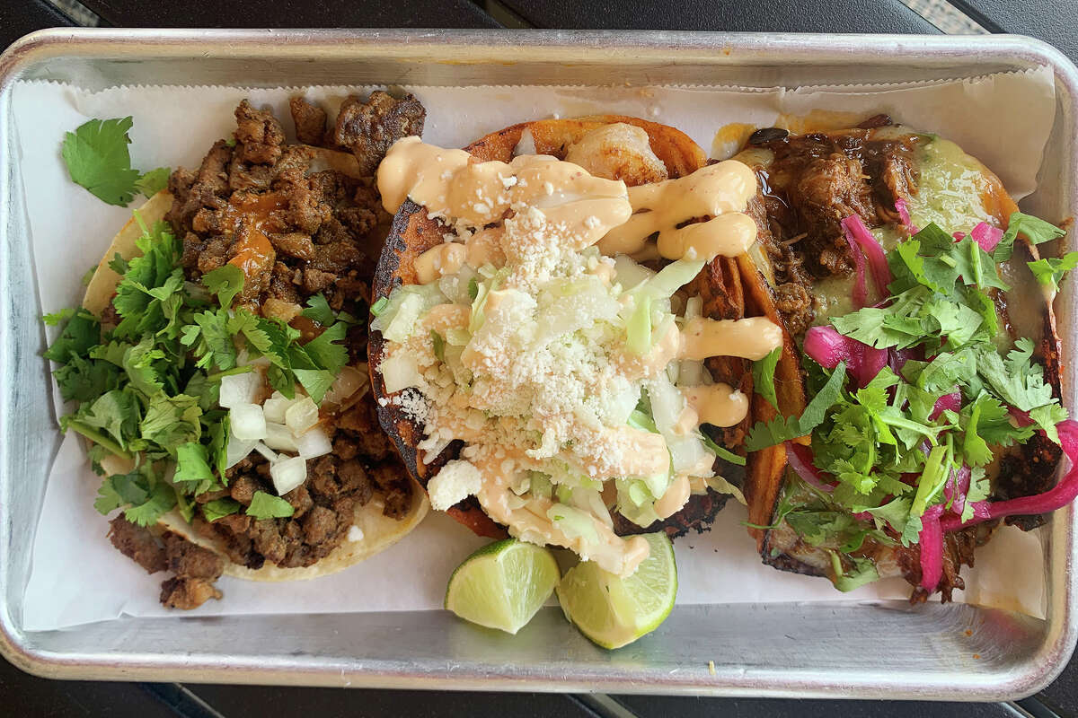 West Coast Taco Bar and its popular food truck offer eight street tacos, including, from left, the citrus-and-spice marinated Asada, the Sac Town Fire shrimp and the Dirty Diana slow-cooked birria.