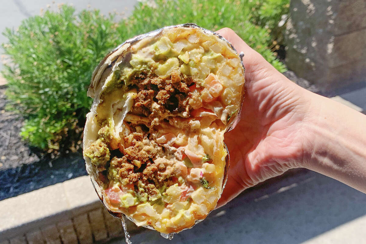 The Bitchin Cali Burrito at West Coast Taco Bar in Elk Grove is an homage to the owners San Diego roots where the carne asada and French fry combination was born.
