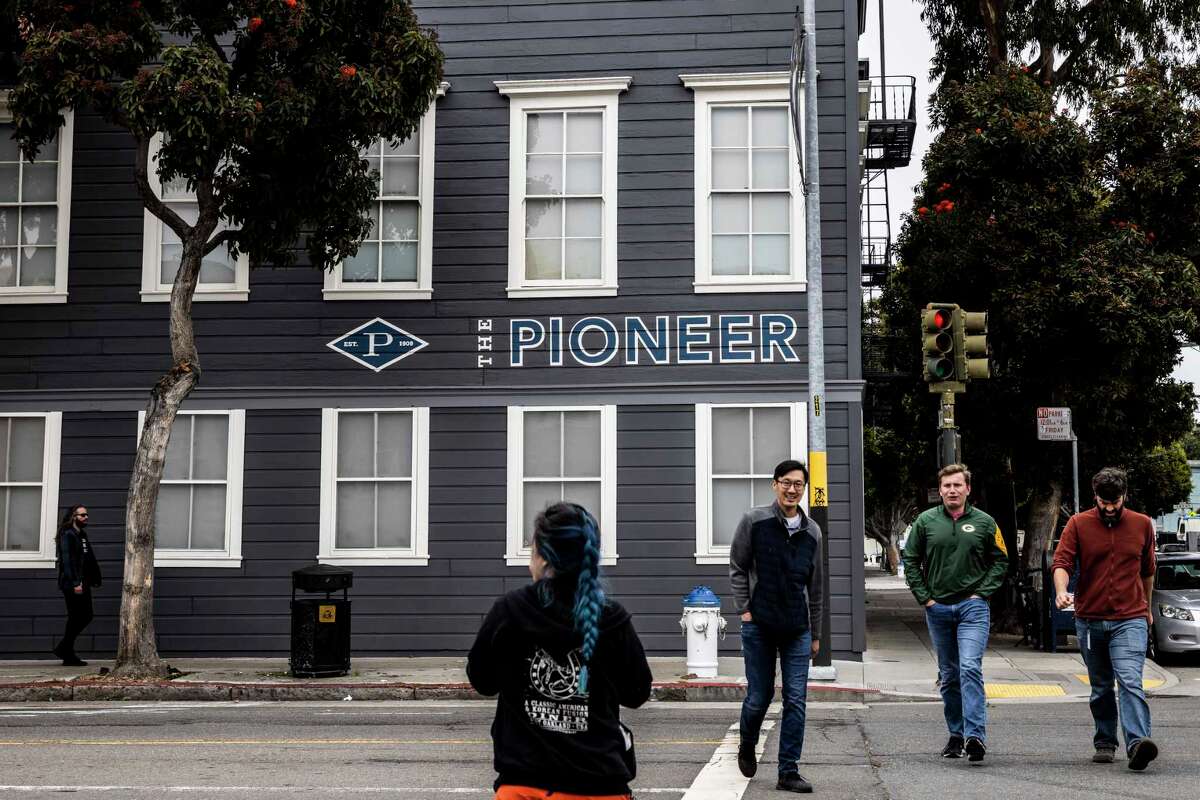 Exterior view of the historic Pioneer Building, home of OpenAI's headquarters in San Francisco. The company is part of a growing artificial intelligence company in the city.